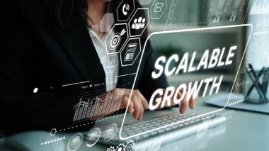 Modern bir dijital çalışma alanında ölçeklenebilir büyüme kavramı ve veri görselleştirmesi olan profesyonel bir klavyede daktilo. Asemptotik akıllı veri analitiği.