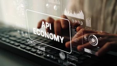 API Ekonomi ve Teknoloji Eğilimlerini Temsil Eden Dijital Grafiklerin Üstüste konduğu Klavyede Eller Yazıyor. Asemptotik akıllı veri analitiği.