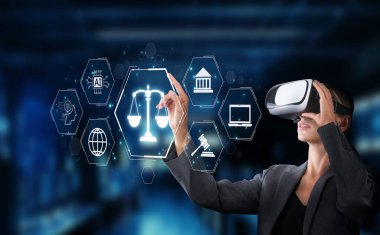 Bu görüntü sanal gerçeklik teknolojisini kullanarak sanal zeka, etik ve yasal çerçeve kavramlarını dijital bağlamda kullanan bir profesyoneli yakalar. XDMCP