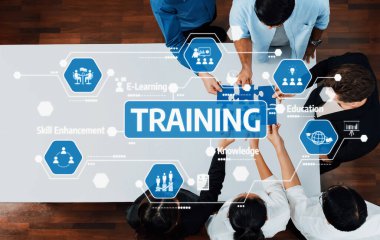 Yetenek geliştirme ve bilgi paylaşımı konusunda işbirliği yapan farklı bireyleri gösteren dinamik bir eğitim oturumu. E-öğrenme ve etkileşimli stratejilere odaklan. Dostluk