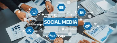 Sosyal medya stratejileri, işbirliği, veri analizi ve modern ofis ortamında etkili iletişimi vurgulayan dinamik bir iş toplantısı. Dostluk