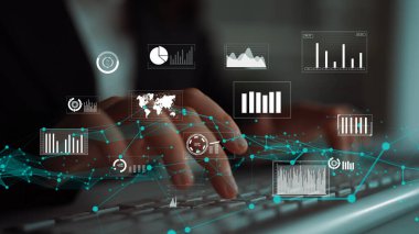 Dijital grafikler ve metriklerle çevrili bir klavyede yazan eller. Bu görüntü iş analitiği, teknoloji entegrasyonu ve veri görselleştirme kavramlarını temsil eder. Xenic
