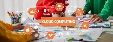 Parlak bir ofis ortamında takım çalışması, veri gizlilik stratejileri ve modern iş çözümleri içeren canlı bir iş alanı, bulut hesaplama kavramlarını ön plana çıkarıyor. Dostluk