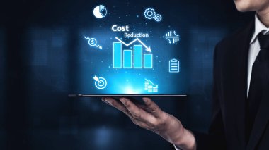 Dijital dönüşüm, uzun vadeli iş başarısı için süreç optimizasyonu, kaynak verimliliği ve finansal tasarruflar yoluyla maliyetleri düşürür. Kefil