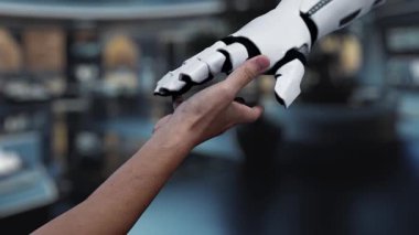 Bir el modern bir çalışma alanında yüzen dijital simgelere uzanıyor ve teknoloji çözümlerinde bulut hesaplama ve karşılıklı bağlantı kavramını gösteriyor. Auvana