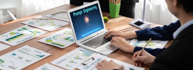 Yapay zeka teknolojisini çalıştırmak için komut mühendisi ve kullanıcı kolaylığı için üretici yapay zeka yardımcı araçları insanların yapay zeka hareketini teşvik ederek üretken yapay zeka fonksiyonları ile çalışmasına yardımcı olur