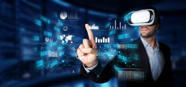 Sanal gerçeklikteki bir işadamı yüksek teknolojili bir ortamda veri analiziyle ilgileniyor, finansal planlama, pazarlama stratejileri ve yatırım sezgilerine odaklanıyor. XDMCP