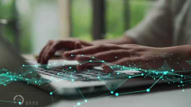 Modern bir çalışma alanında veri analizi, iş büyümesi ve dijital dönüşümü sembolize eden, yüzen grafikler ve metrikler içeren bir dizüstü bilgisayarda yazı yazan ellerin detaylı bir görüntüsü. Xenic