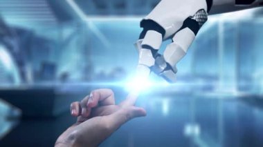 İnsan eline uzanan robot bir elin çarpıcı görsel görüntüsü, yüksek teknolojili bir dünyada yapay zeka ve insanlık arasındaki etkileşimi sembolize ediyor. Auvana