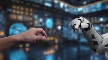 Bu video insan eli ile yapay zekayı sembolize eden robot el arasındaki etkileşimi yakalıyor. Veri simgeleri ve grafiklerle dolu fütüristik bir dijital alan sergiliyor. Auvana