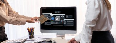 Yapay zeka teknolojisini çalıştırmak için komut mühendisi ve kullanıcı kolaylığı için üretici yapay zeka yardımcı araçları insanların yapay zeka hareketini teşvik ederek üretken yapay zeka fonksiyonları ile çalışmasına yardımcı olur