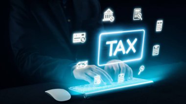Bu resim, modern dijital vergi yönetimi ve e-dosyalama sistemlerini gösteren, parlayan bir vergi sembolü ve çeşitli finansal simgelerle birlikte bir klavyede yazan elleri gösteriyor. Dörtgen
