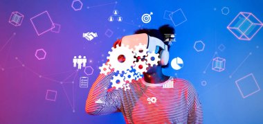 Bir kişi, yenilikçi dijital etkileşimler yoluyla takım çalışmasını ve bağlantıyı vurgulayarak modern bir ortamda gelişmiş teknolojiyi kullanarak sanal işbirliği deneyimi yaşıyor. XDMCP