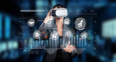 Profesyonel bir kadın, etkili pazarlama stratejileri için teknoloji ve iş analizlerinin kesişimini gösteren sanal gerçeklik çalışma alanındaki verilerle ilgilenir. XDMCP