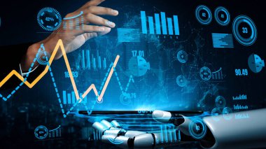 Bir iş adamı gelecekteki veri arayüzü ile etkileşim kurmak için robotik bir el kullanır. Bu resim ileri teknoloji vasıtasıyla piyasa eğilimleri ve performans ölçümlerinin analizini gösteriyor. Xenic