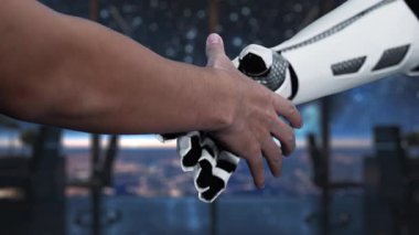 Bir insan eli dijital bir arayüzü işaret ederken, bir robot el modern bir teknoloji ortamında yapay zeka ve insan zekası arasındaki ilişkiyi gösteriyor. Auvana