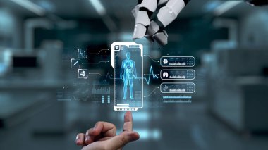 Robot ve insan eliyle insan anatomisi ikonunu işaret ediyor. Robot el ve insanın birlikte çalışırken röntgen hologramıyla bulanık labaratuvarı işaret etmesine yakın çekim. Sağlıklı..