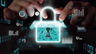 Parlayan bir kilit sembolü içeren, veri koruması, siber güvenlik ve teknolojiyi temsil eden, dinamik grafiksel elementlere sahip dijital güvenlik kavramı. Xenic