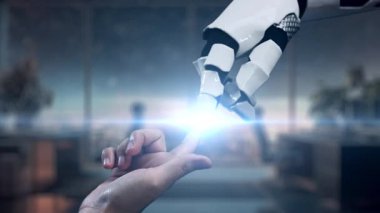 Robot bir el, insan eliyle teknoloji ve yeniliğin bütünleşmesini sembolize etmek için etkileşime girer. Gelecekteki büyüme ve başarı için gereken işbirliğini vurgular. Auvana