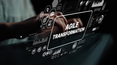 Eller dijital ekranda veri analizlerini ve modern bir iş ortamında çevik dönüşümle ilgili kavramları gösteriyor. Asemptotik akıllı veri analitiği.