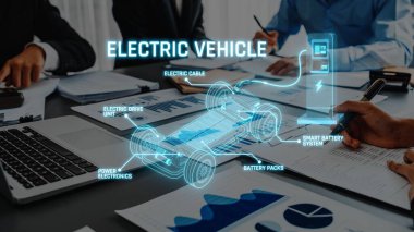 This image illustrates key components of an electric vehicle, highlighting the battery system, electric drive unit, and modern charging infrastructure for sustainable transport solutions. Raster