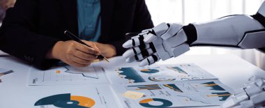 Bir ofis ortamında insan ve robot arasında benzersiz bir işbirliği, stratejik planlama ve karar verme için veri analizi. Noogenesis