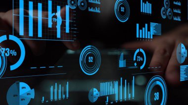 Engaging data visualization showcasing hands interacting with digital charts and graphs, emphasizing the importance of analytics and insights in business decision-making. Xenic