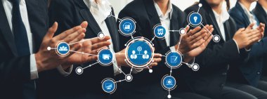 Business Team Collaboration with Icons Representing Connection, Communication, Data Sharing, and Professional Growth in a Modern Office Environment. Amity