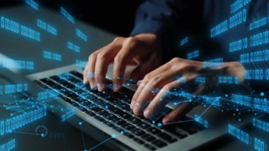 This image showcases hands typing on a laptop, overlaid with digital data graphics, signifying the fusion of technology and analytics in a modern workspace. Xenic