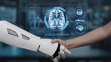 Robot el ve beyin hologramıyla insan eli sıkışıyor. Yapay zeka ve insanın birlikte çalışması ya da bulanık laboratuarlı beyin hologramıyla anlaşma yapması. Takım çalışması. Sağlıklı..