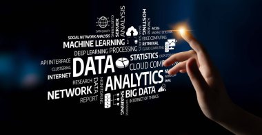 A conceptual image showcasing data analytics with a hand reaching towards a blend of digital elements, representing trends in machine learning and big data. Tessel