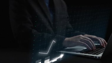 A business professional engages with a laptop, showcasing a graphical representation of rising trends and financial growth in a modern workspace. Copula