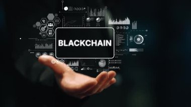 Hand Holding Blockchain Concept with Digital Graphics and Technology Icons Representing Innovation and Data Management. Asymptotic smart data analytic.