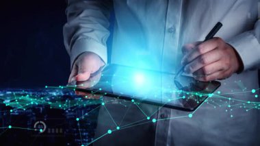 A professional individual engages with a tablet showcasing interactive graphs and data visualizations, symbolizing modern business strategies and analytics. Xenic