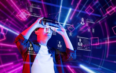 A person wearing a VR headset engages with advanced digital identity and cybersecurity tools in a vibrant virtual environment focused on safety and protection. XDMCP