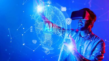 A young man fully immersed in a virtual reality world, expressing excitement while interacting with holographic AI elements in a captivating blue environment. Raster