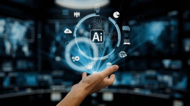 Bir el, insan etkileşimi ve dijital teknoloji arasındaki bağlantıyı sembolize eden yüksek teknolojili bir ortamda yüzen yapay zeka simgelerine uzanıyor. Auvana