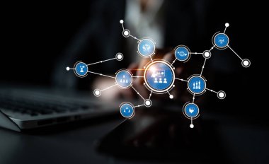 This image illustrates a creative digital network concept with vibrant icons, showcasing technology and communication within a dark background. Tessel