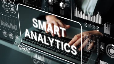 Hands Typing on Laptop with Smart Analytics Overlay and Data Visualization Elements for Business Insights and Technology Applications. Asymptotic smart data analytic.