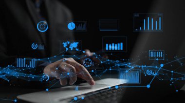 A business professional engages in data analysis on a laptop, surrounded by futuristic charts and graphs, enhancing comprehension of growth metrics in a modern environment. Xenic