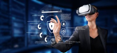A businesswoman engages with virtual reality technology, focusing on cybersecurity and data protection, highlighting the importance of safety in the digital landscape. XDMCP