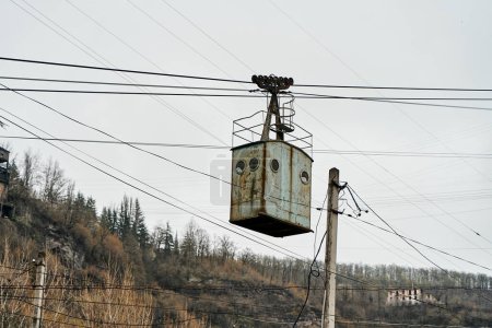 Photo for Old rusty cable car trolley in an industrial mining town. - Royalty Free Image