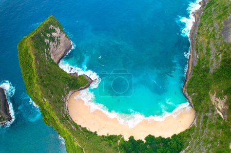 Cinematic aerial landscape shots of the beautiful island dinosaur of Nusa Penida. Huge cliffs by the shoreline and hidden dream beaches with clear water