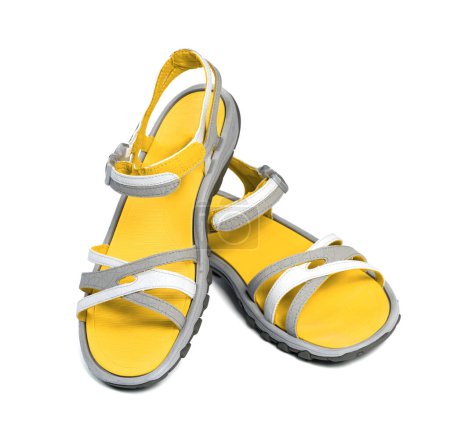Foto de Pair of yellow summer sandals. Isolated on white background - Imagen libre de derechos