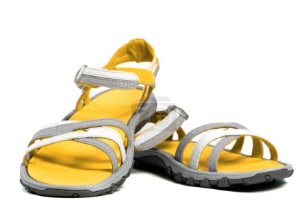 Foto de Pair of yellow summer sandals. Isolated on white background. - Imagen libre de derechos