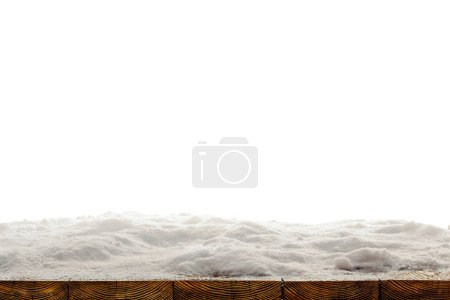 Téléchargez les photos : Un fond de Noël d'hiver avec de la neige sur le bois - en image libre de droit