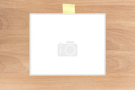 the polaroid card on the table