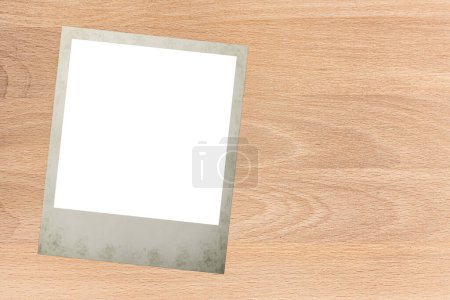 the polaroid card on the table