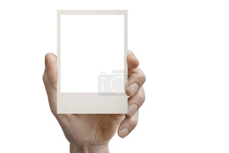 Téléchargez les photos : Carte polaroid vierge dans une main sur les fonds png - en image libre de droit