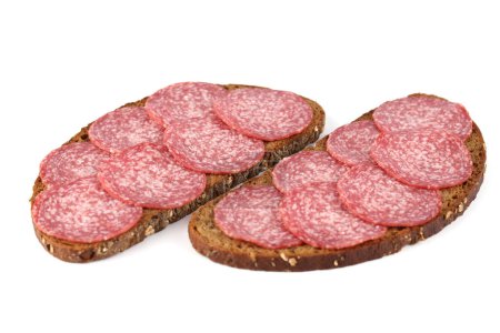 Foto de Dos sándwiches con salami aislados sobre fondo blanco. - Imagen libre de derechos